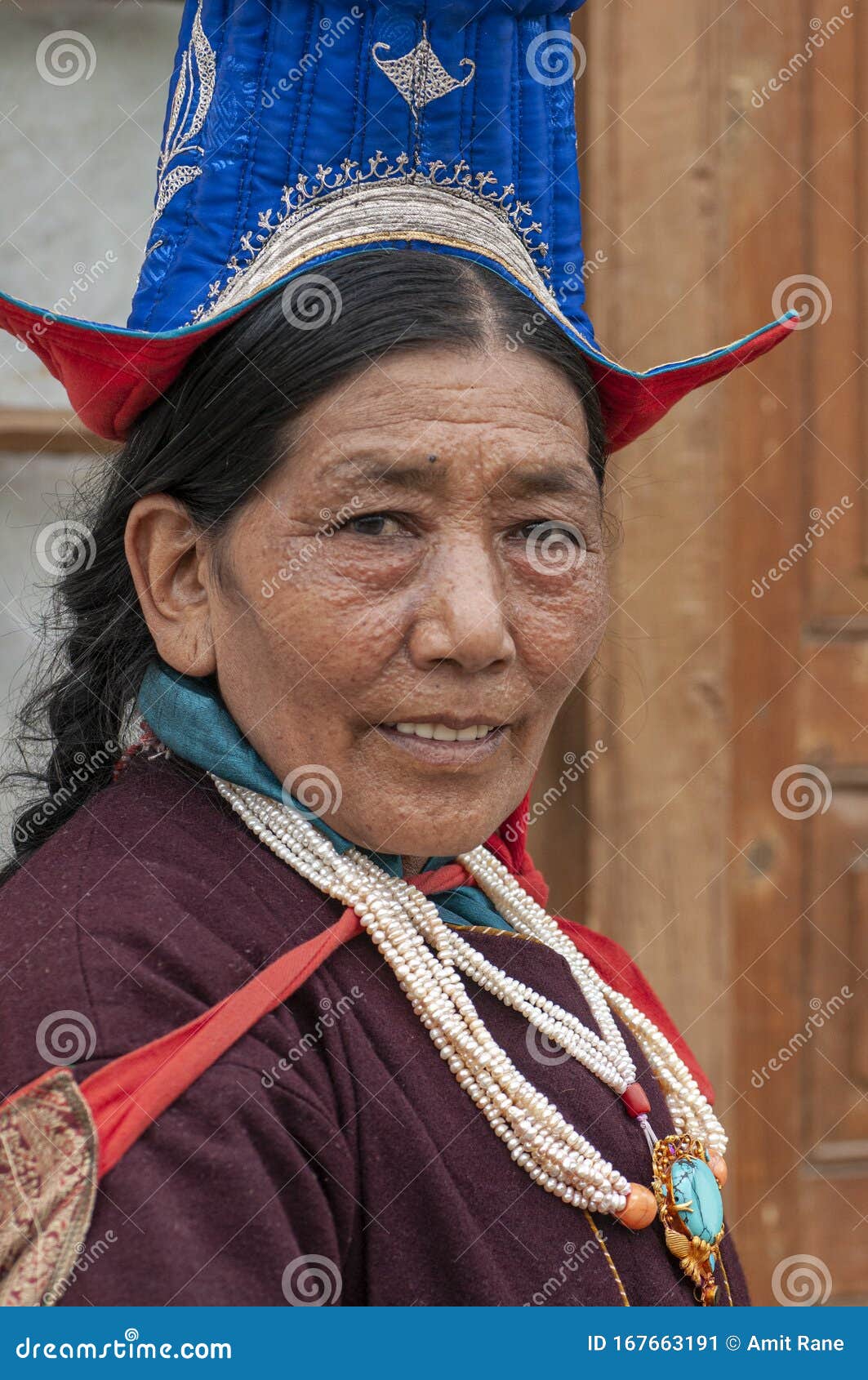 Portrait of a Ladakhi Woman in Traditional Attire during Dalai Lama ...