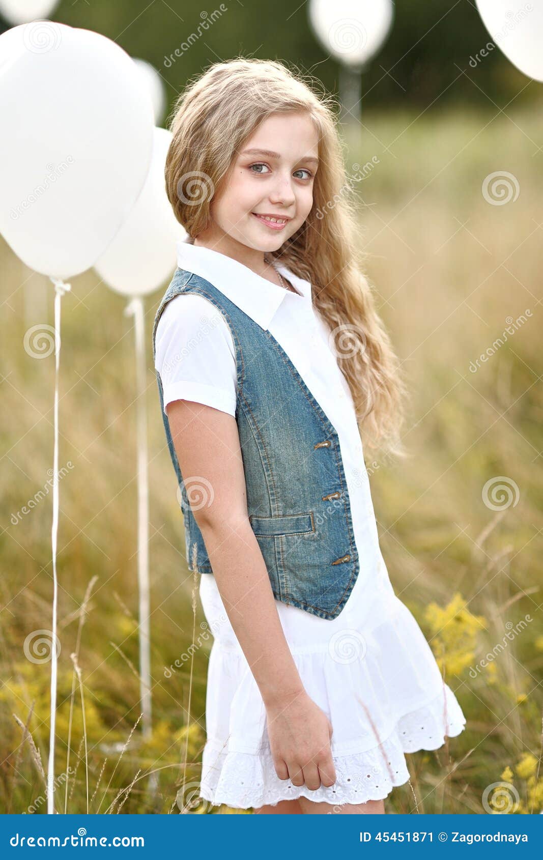 Portrait of a Little Girls in a Field Stock Image - Image of white ...