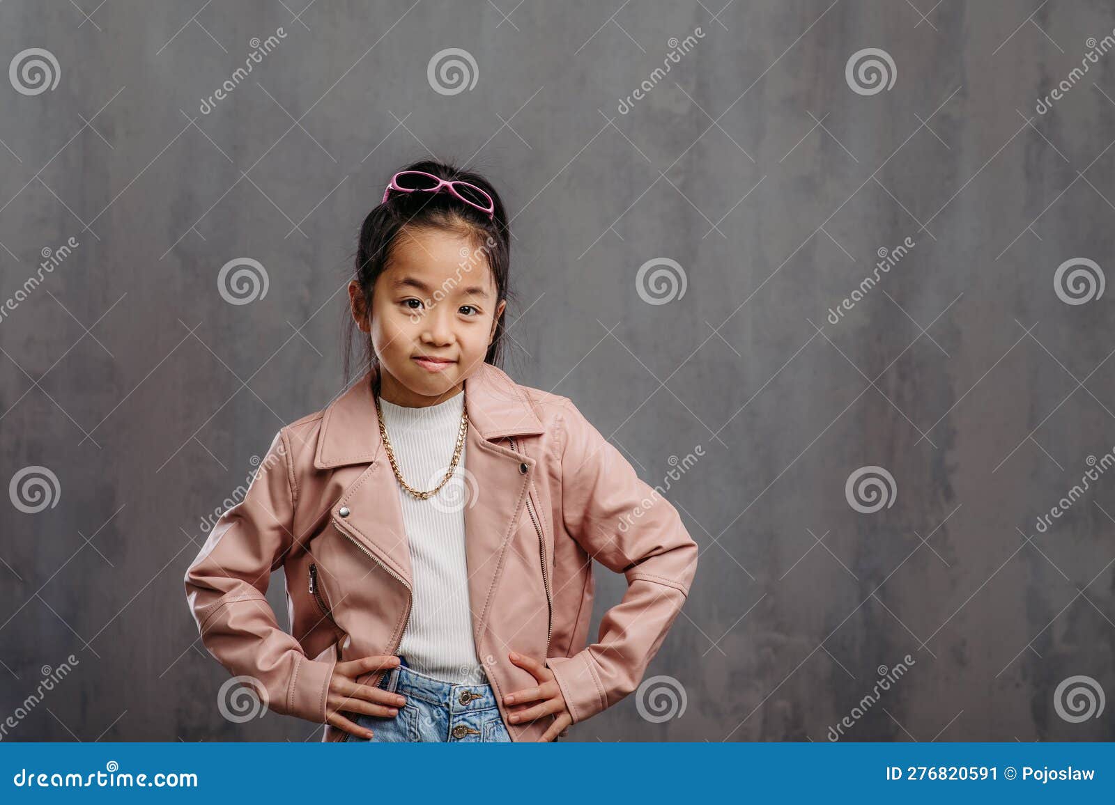 portrait of little japanesse girl with leather jacket.