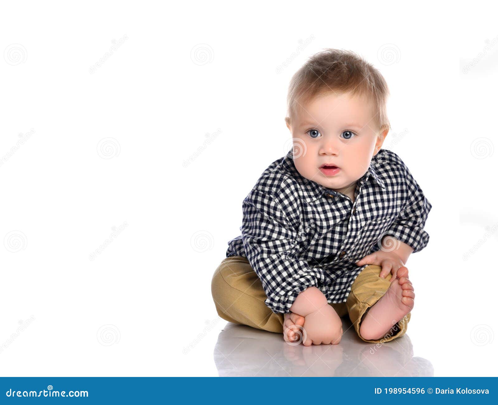 Portrait Of A Little One Year Old Baby Boy Crying On A White Stock