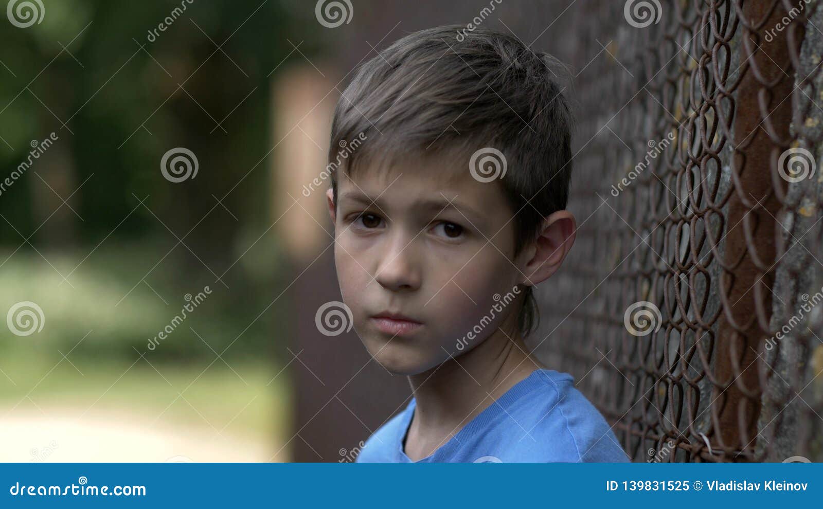 Portrait of a Lonely Boy Looks into the Camera with Pain on Face Stock ...