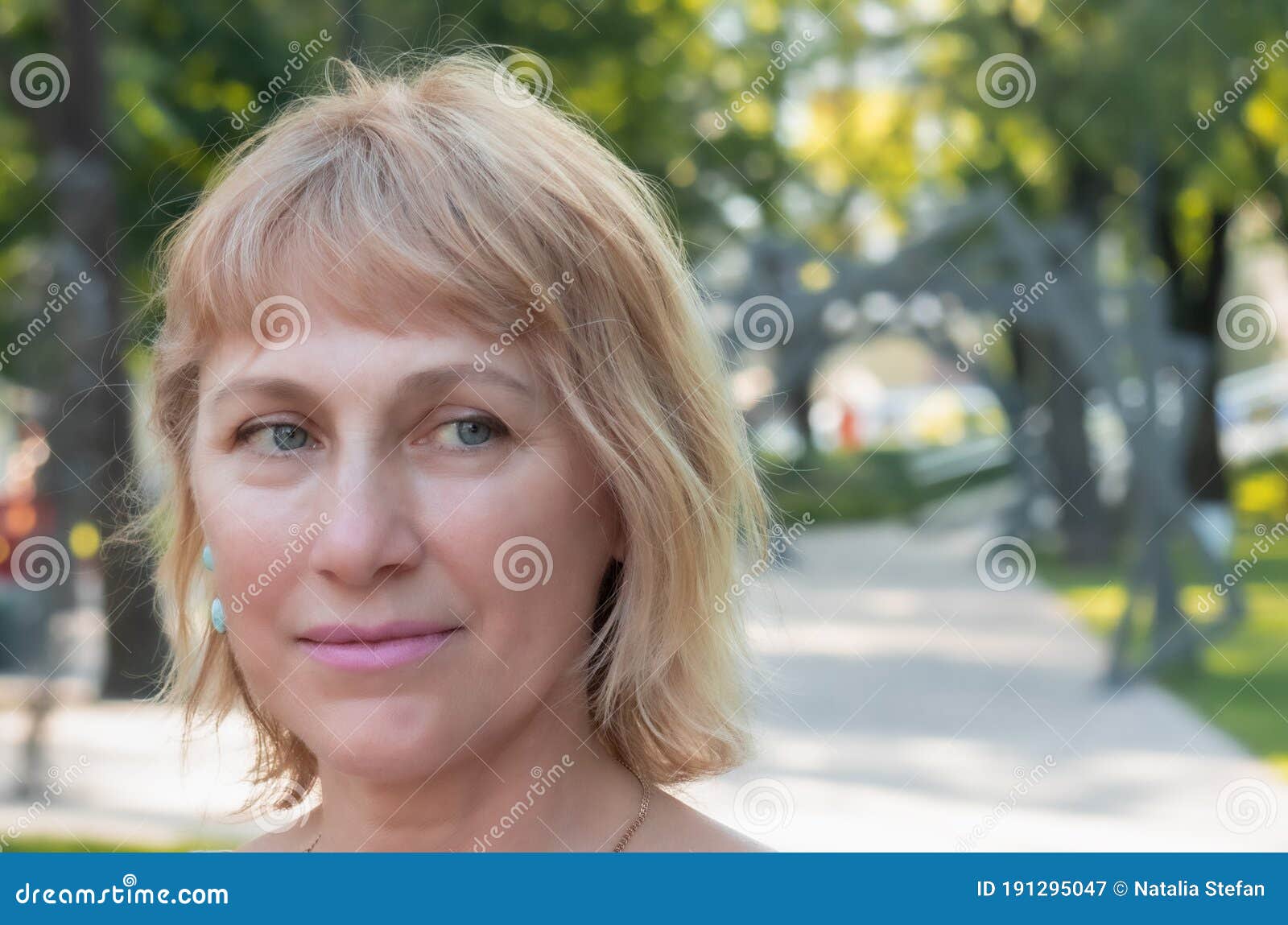 Portrait Of A Lovely Nice Pretty Fifty Year Old Blonde Woman Stock