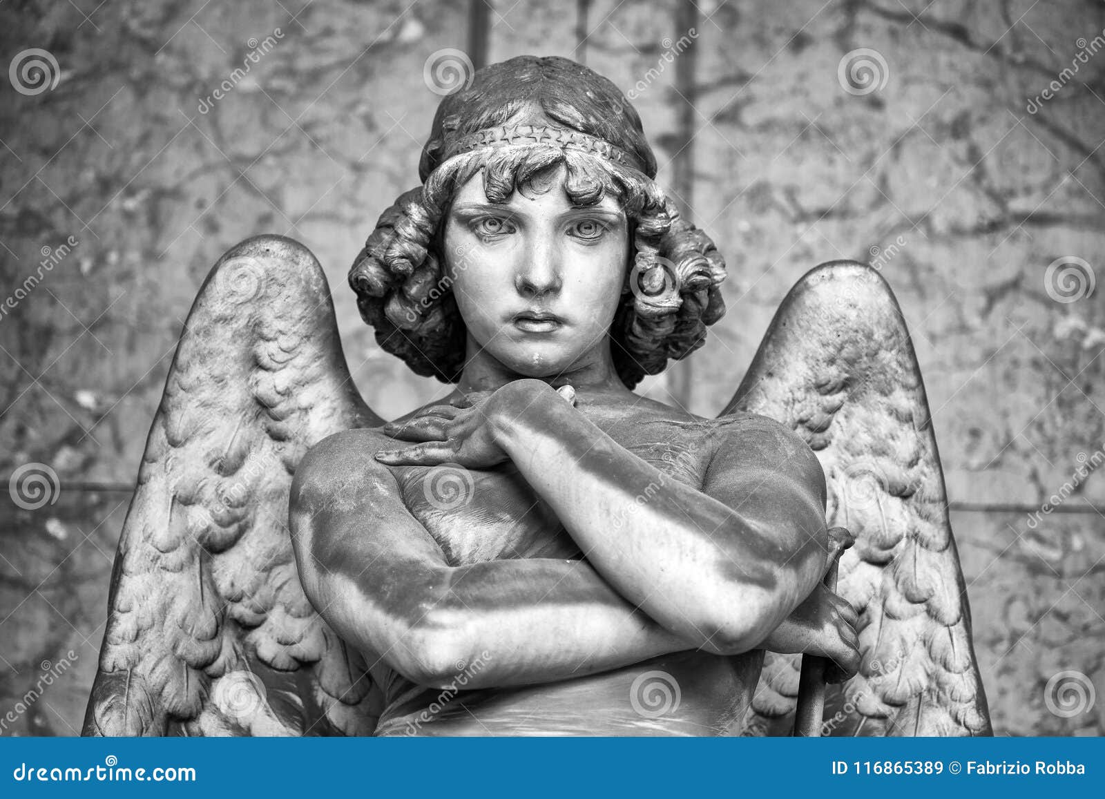 portrait of loving angel on marble, monumental cemetery of genoa, italy, one of the most important monumental cemeteries in europe