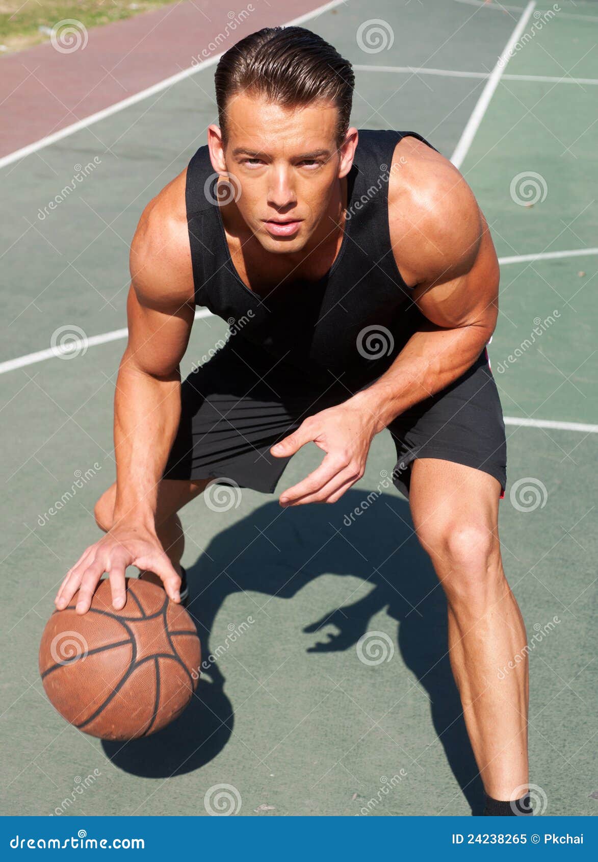Portrait of a Male Basketball Player Stock Image - Image of young, park