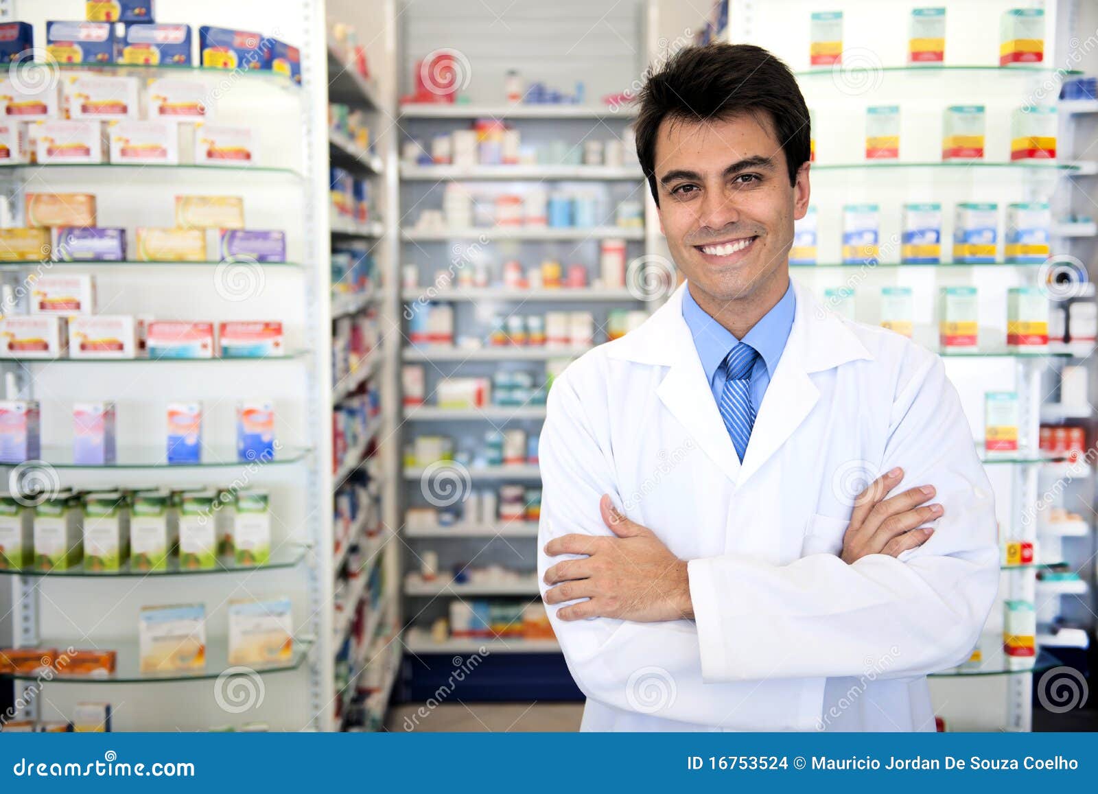 portrait of a male pharmacist at pharmacy