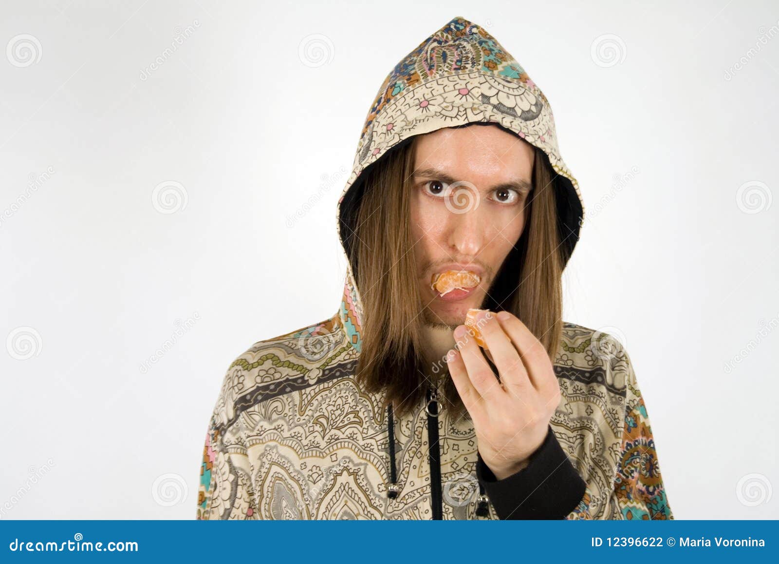 Portrait of a Man Eating Tangerine Stock Photo Image of ethnic