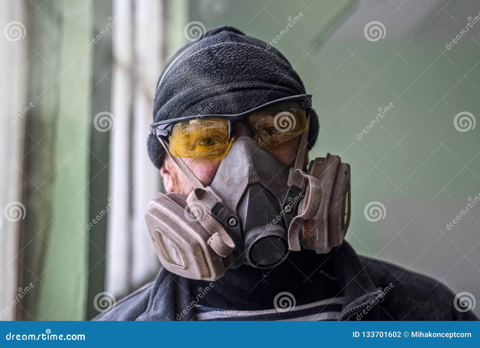 portrait of a man in a respirator, free space