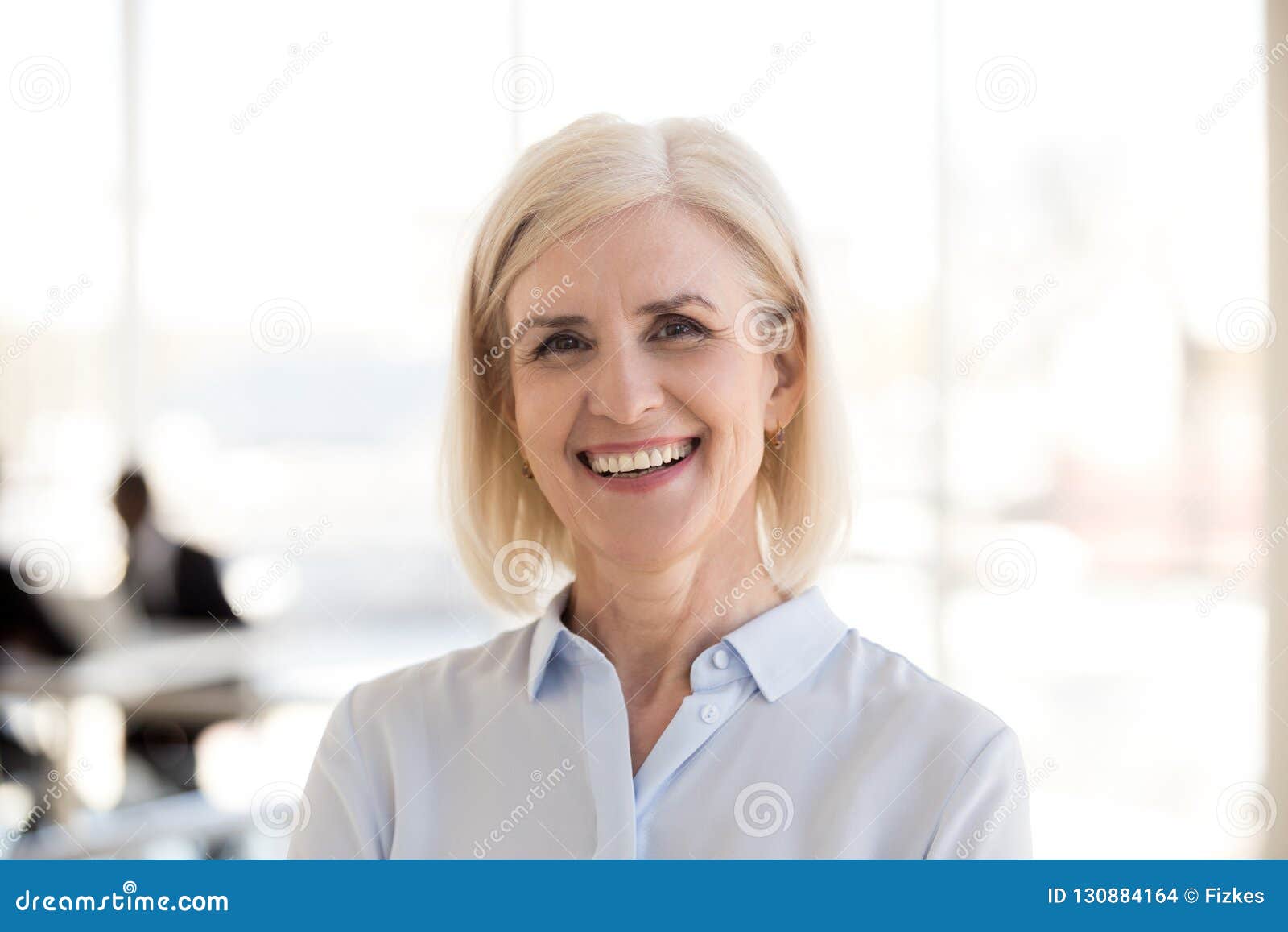 Photo of smiling young adult woman