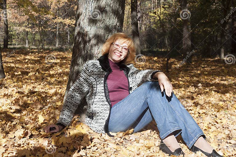 Portrait of a Mature Woman in an Autumn Forest Stock Image - Image of ...