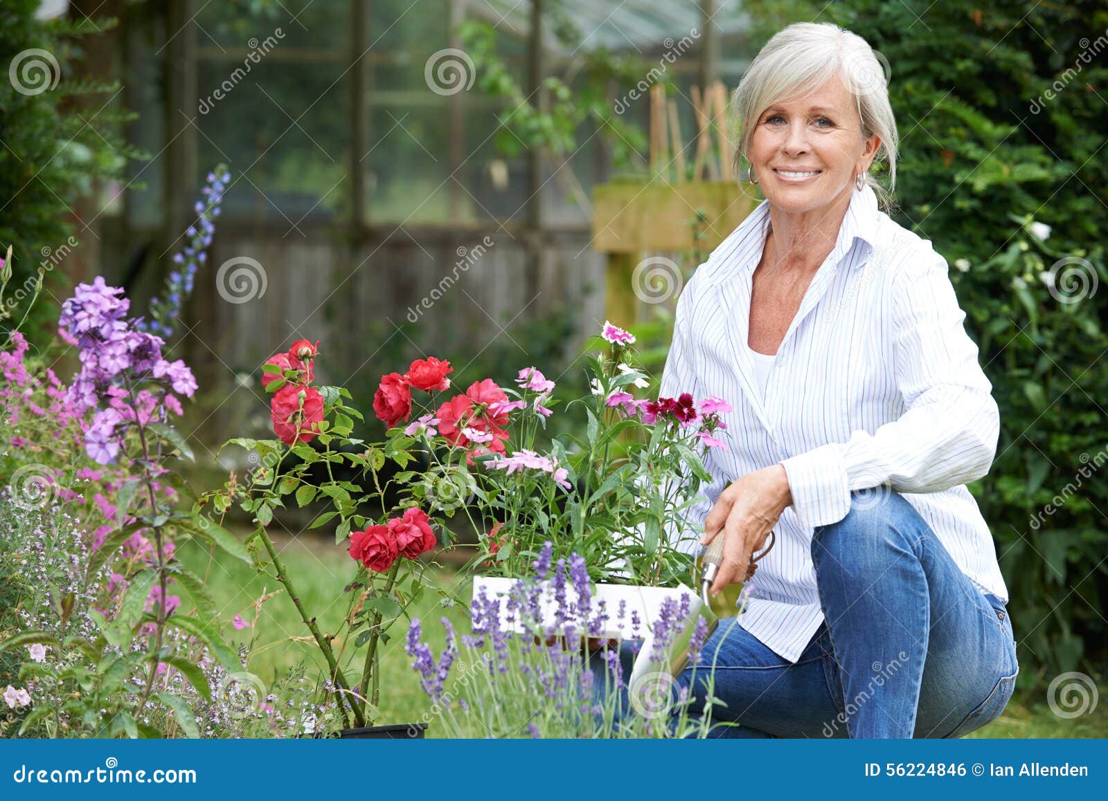 portrait of mature woman gardening