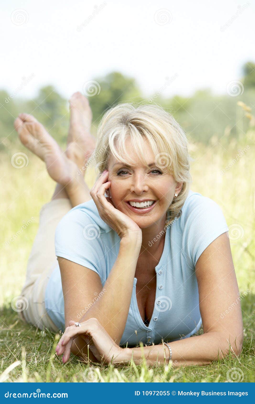 Portrait Of Mature Woman Relaxing In Countryside Stock Image Image Of Three Space 10972055