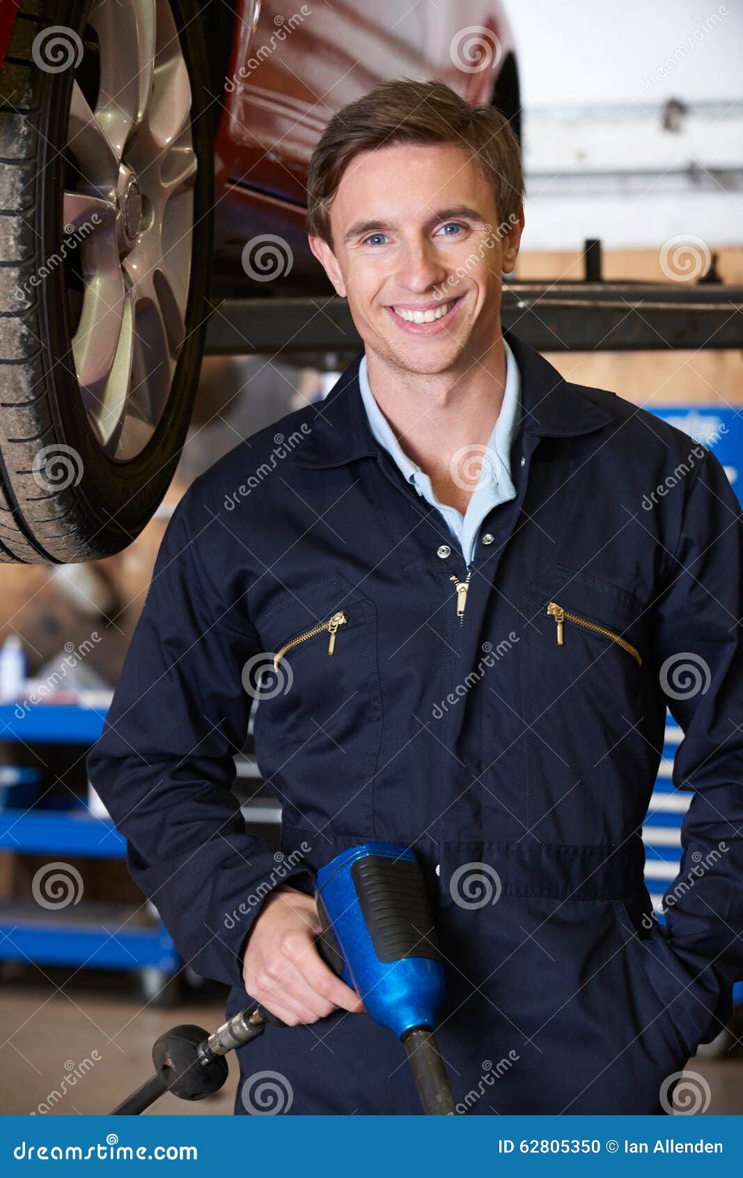 Portrait of Mechanic in Garage with Air Hammer Stock Photo Image of