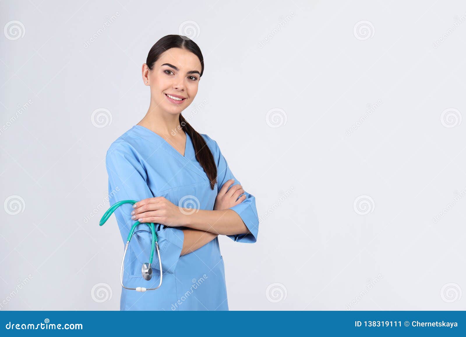 Portrait Of Medical Assistant With Stethoscope On Light Background Stock Image Image Of