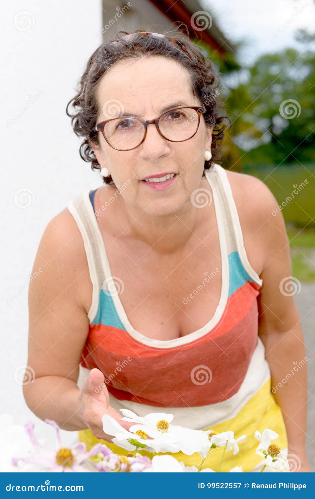 Portrait Of A Middle Aged Brunette Woman With Eyeglasses Outdoor Stock