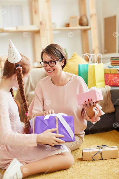 opening-birthday-gifts-stock-photo-image-of-motherhood-150738354