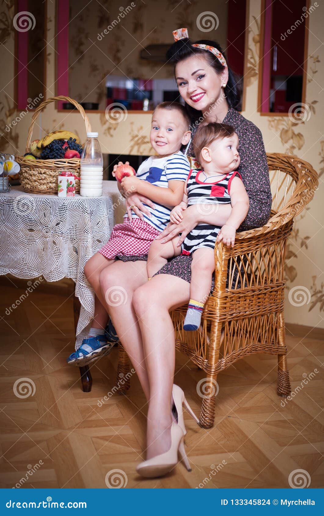 Portrait Of Mother And Two Sons In The Interior Of The