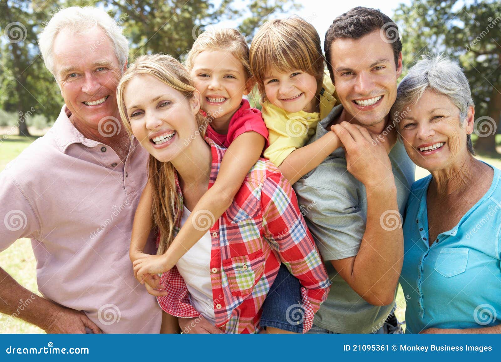 portrait of multi-generation family outdoors