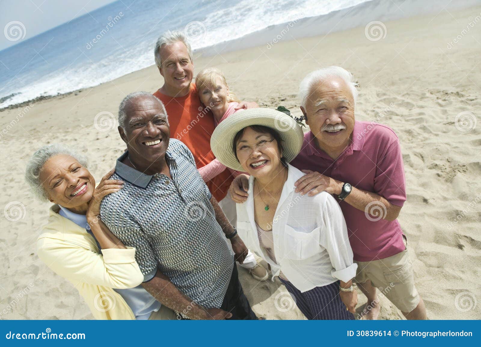 portrait of multiethnic couples at beach