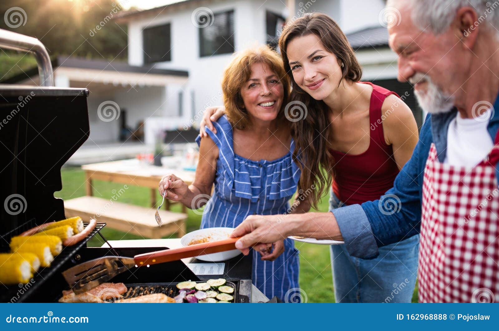 Portrait of Multigeneration Family Outdoors on Garden Barbecue ...