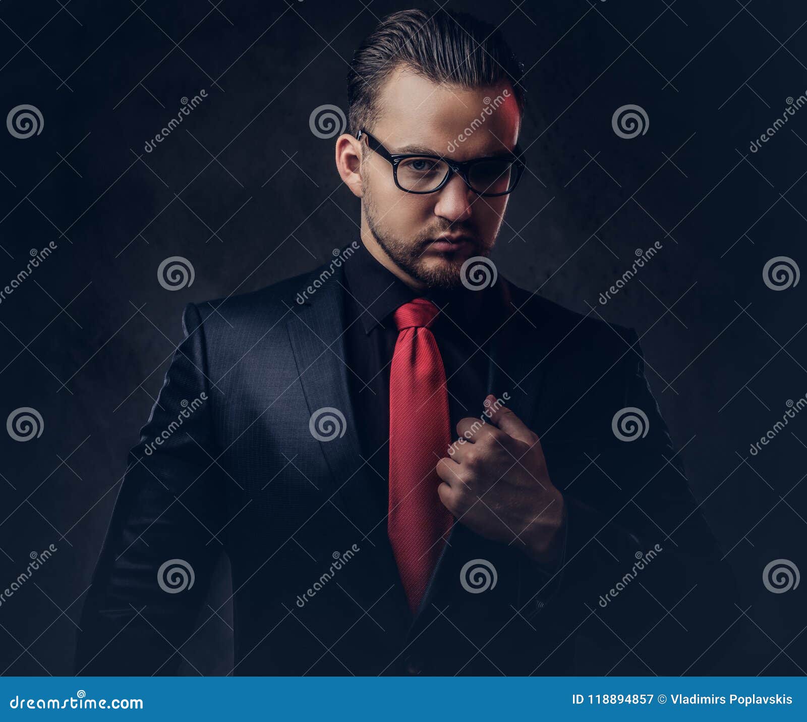 black dress shirt and red tie