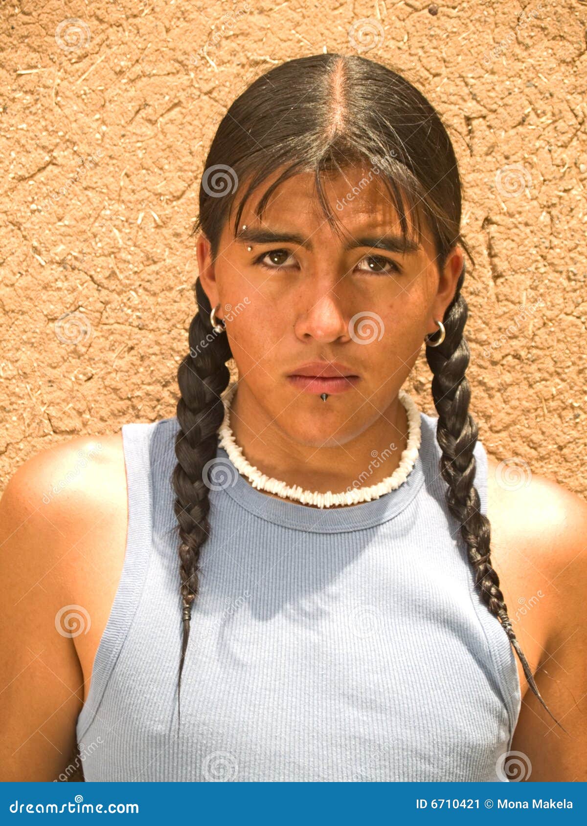 Portrait Of A Native American Teenage Boy Sto
