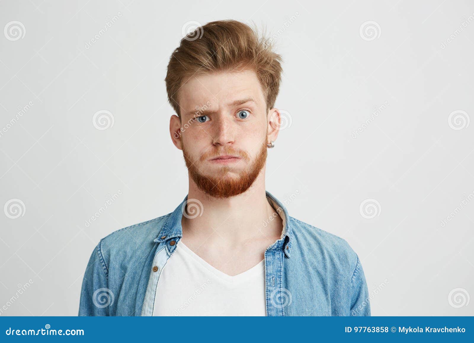 Portrait of Nervous Young Man with Beard Looking at Camera Raising Up ...