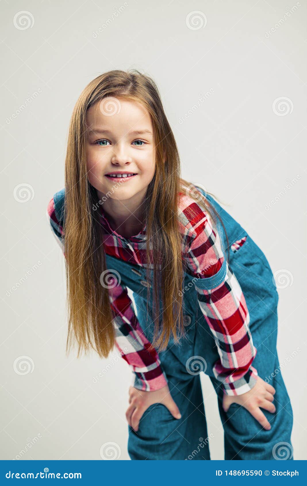 Portrait of a Nice Little Girl. Kid Smiles. Child Model Posing in the  Studio Stock Photo - Image of people, child: 148695590