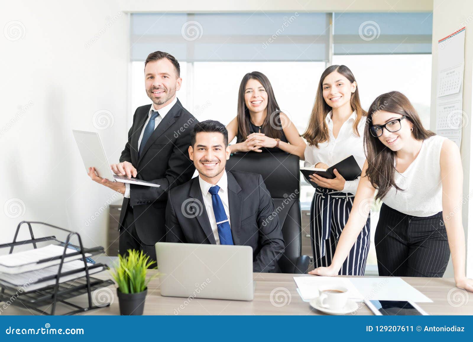 Portrait of Office Staff Smiling at Desk in Office Stock Image - Image of  computer, colleague: 129207611