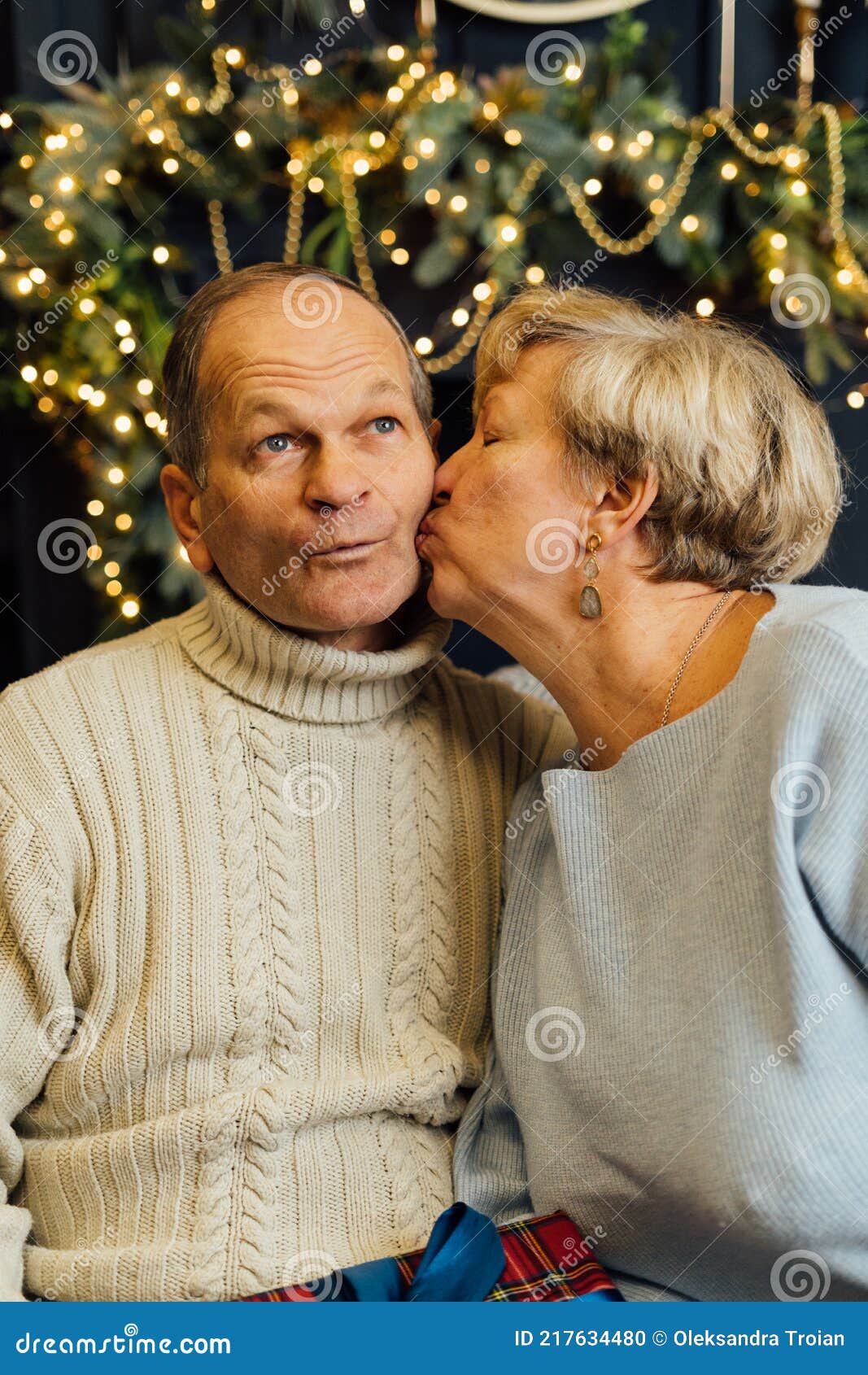 Portrait Of Old Couple Wife And Husband Hugging And Smiling Dark Blue Background Happy Lovers