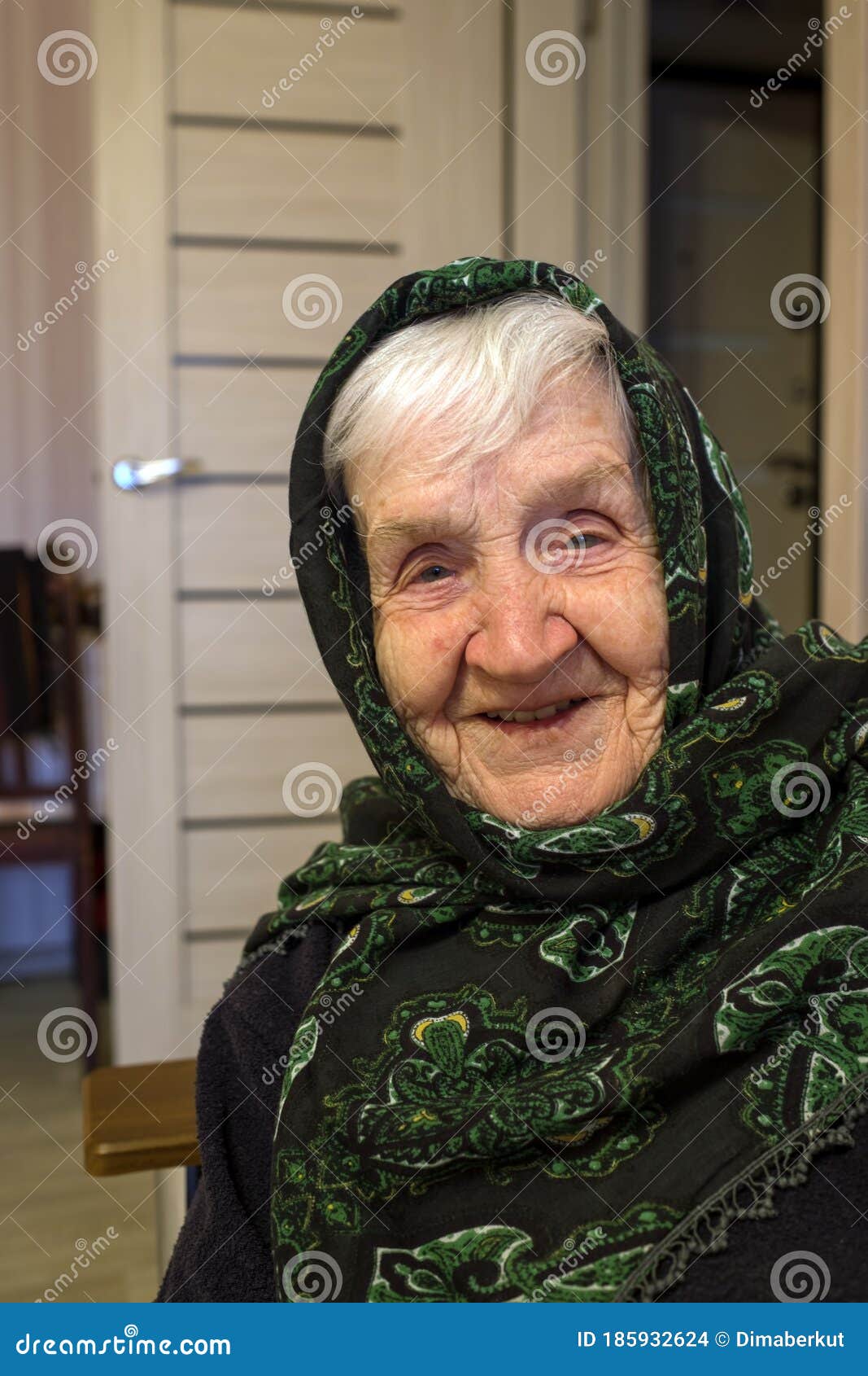 Portrait Of An Old Russian Happy Woman With A Scar