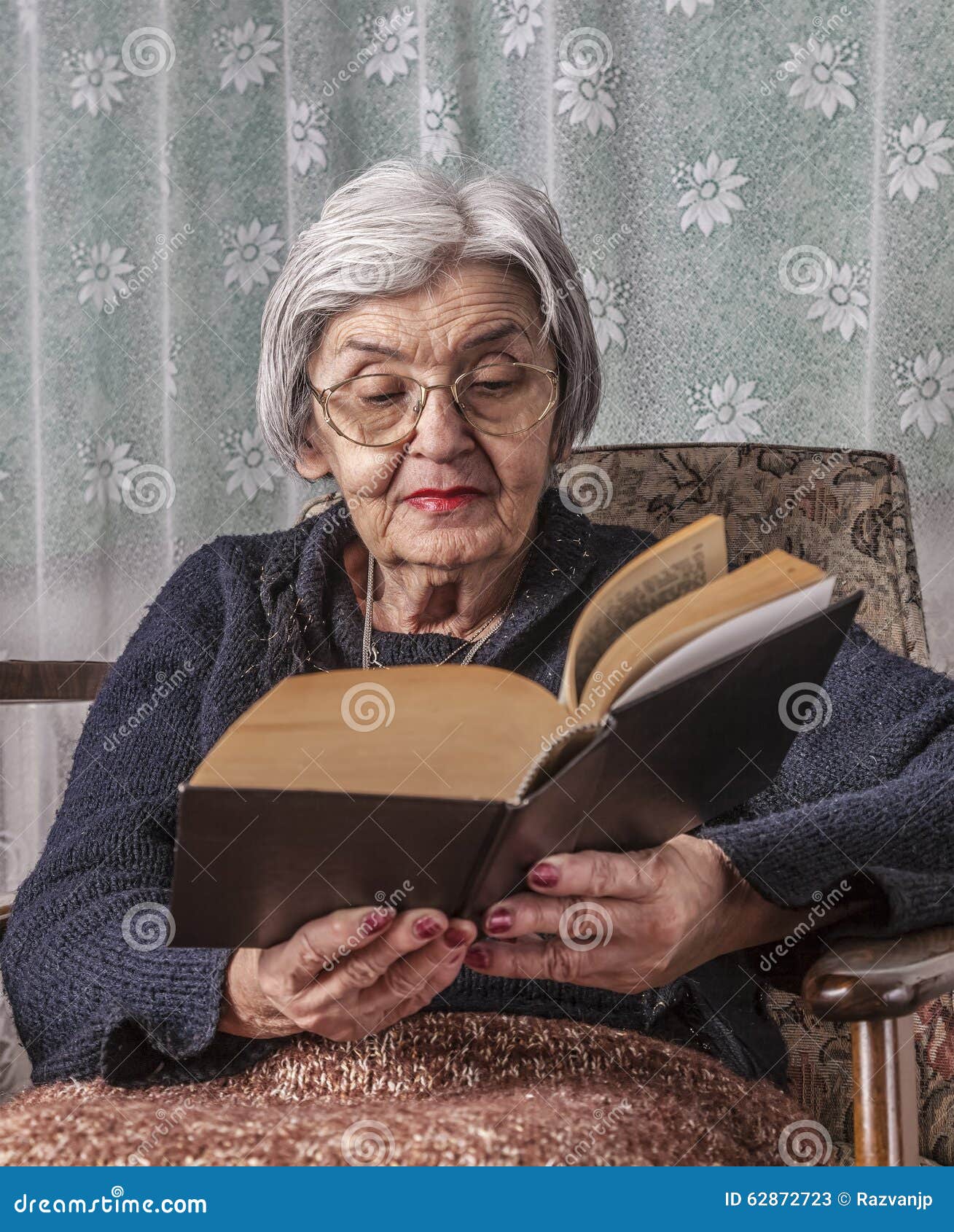 portrait of an old woman reading