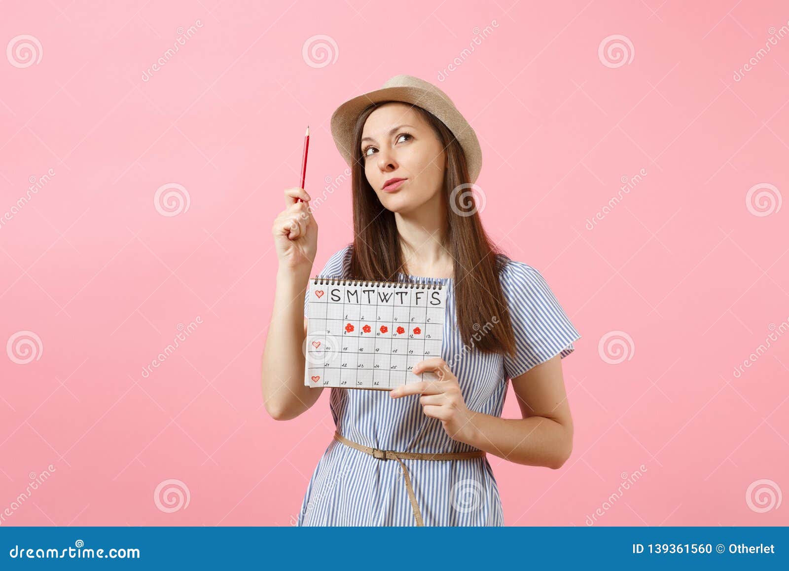 Portrait Pensive Woman In Blue Dress Hat Holding Red Pencil Female