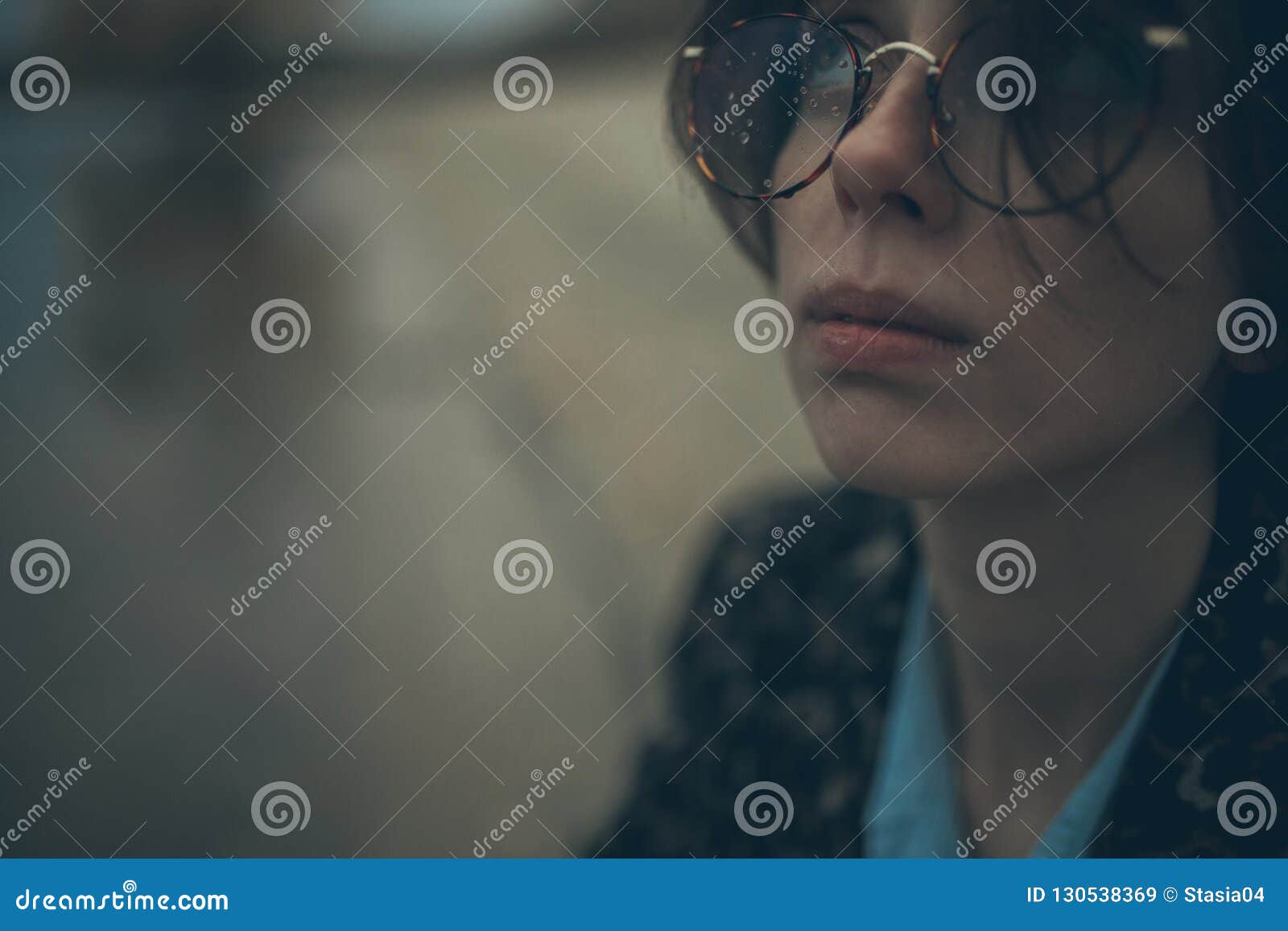 Portrait of Pensive Woman with Misted Glasses in Dusk. Stock Image ...