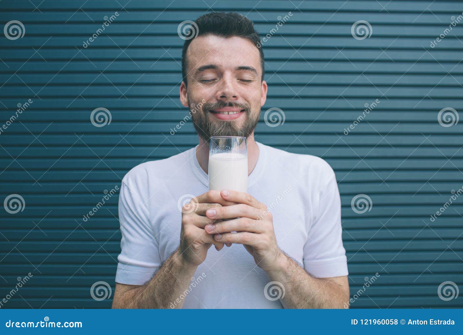 https://thumbs.dreamstime.com/z/portrait-person-holding-glass-milk-close-to-face-enjoying-keeping-eues-closed-isolated-striped-portrait-121960058.jpg