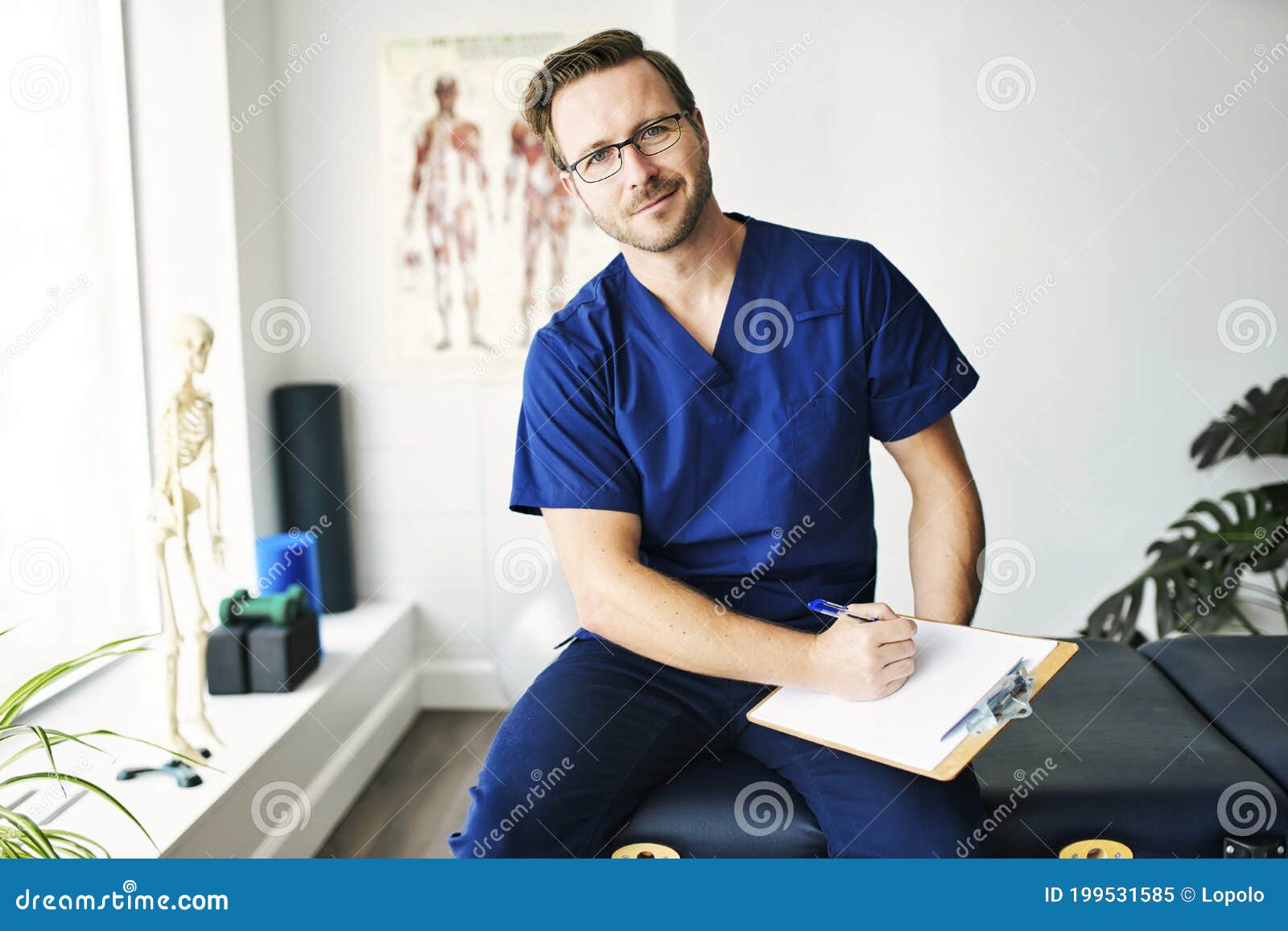 portrait of a physiotherapy man smiling in uniforme