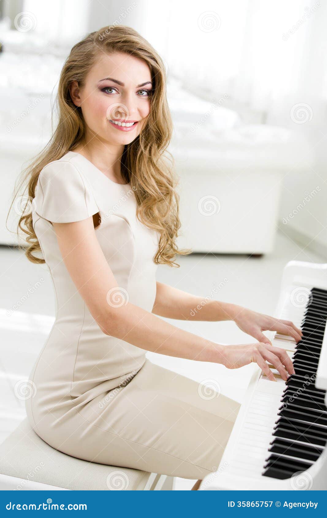 Portrait Of Pianist Sitting And Playing Piano Royalty Free Stock