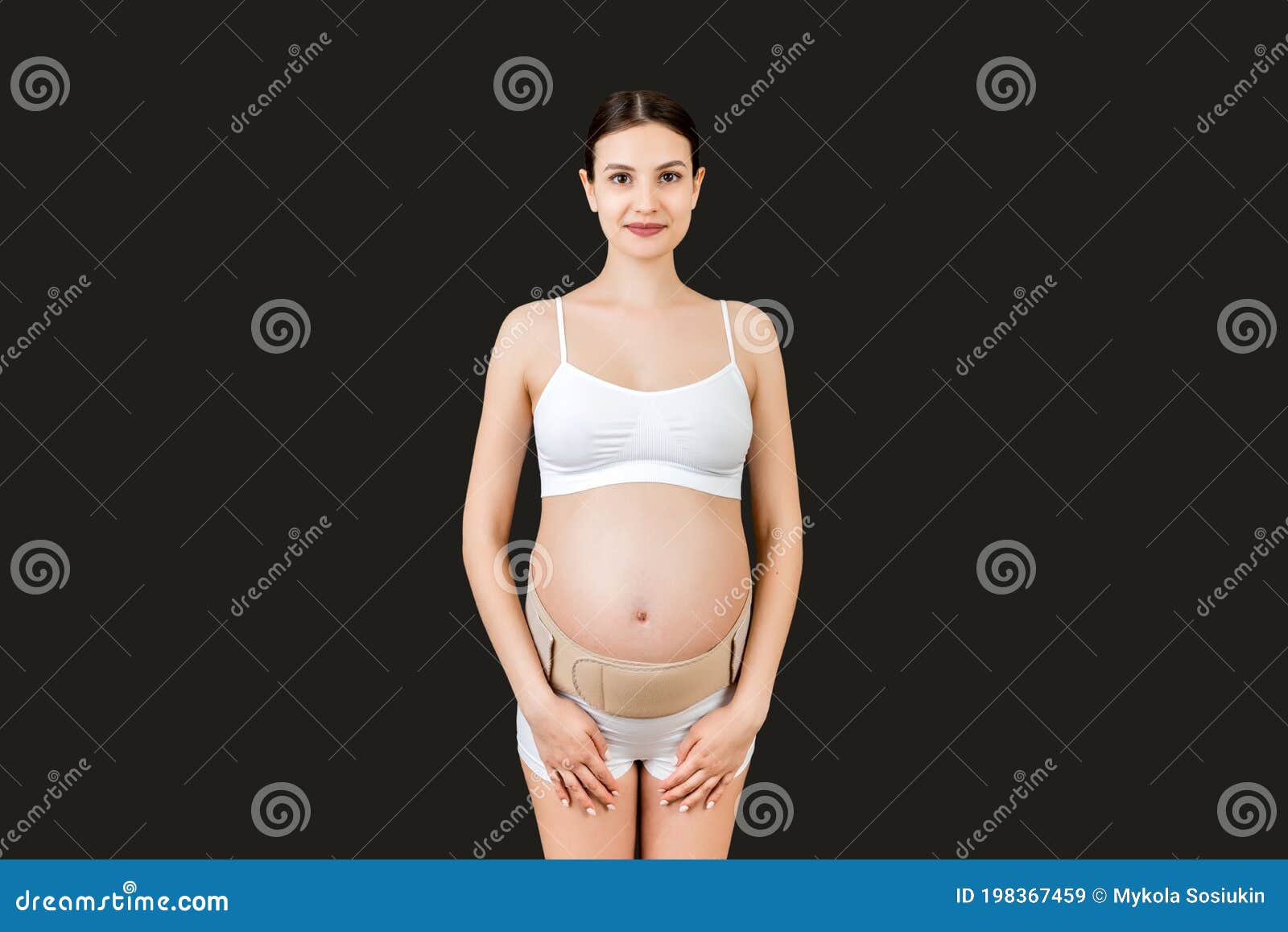 Portrait of Pregnant Woman in Underwear Wearing Pregnancy Bandage at Black  Background with Copy Space. Orthopedic Abdominal Stock Image - Image of  childbirth, abdominal: 198367459