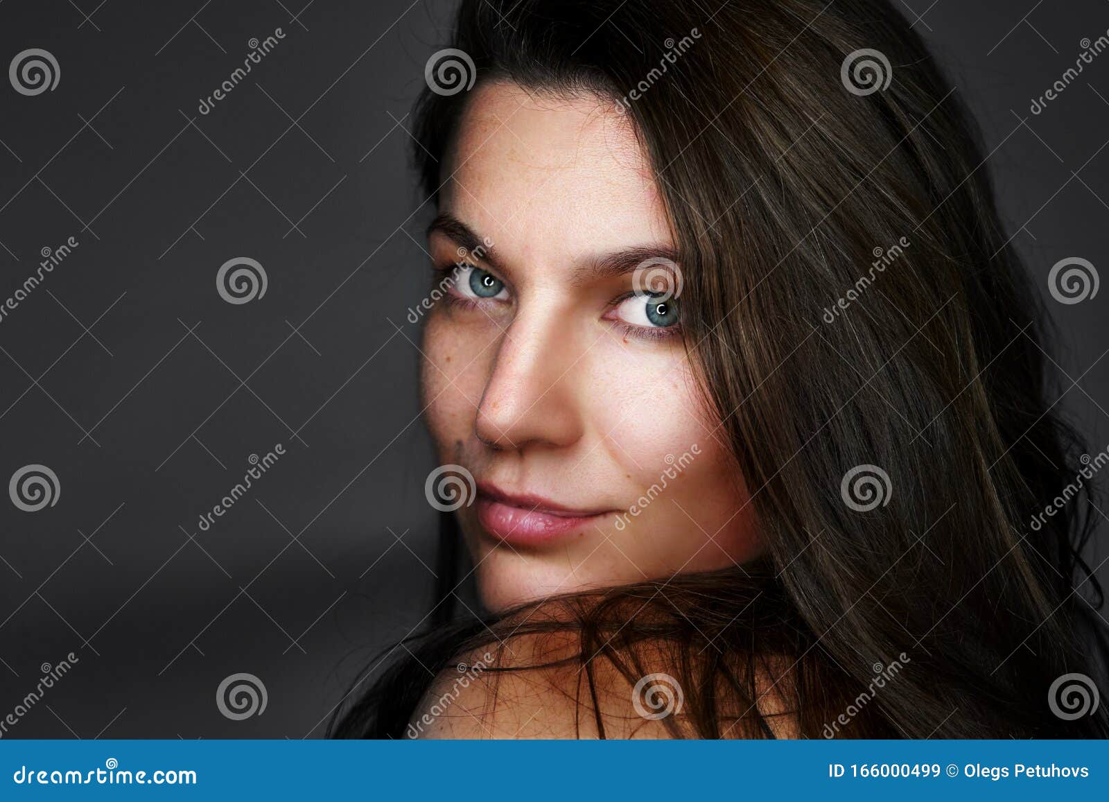 1. "Dark-haired woman with piercing blue eyes" - wide 9
