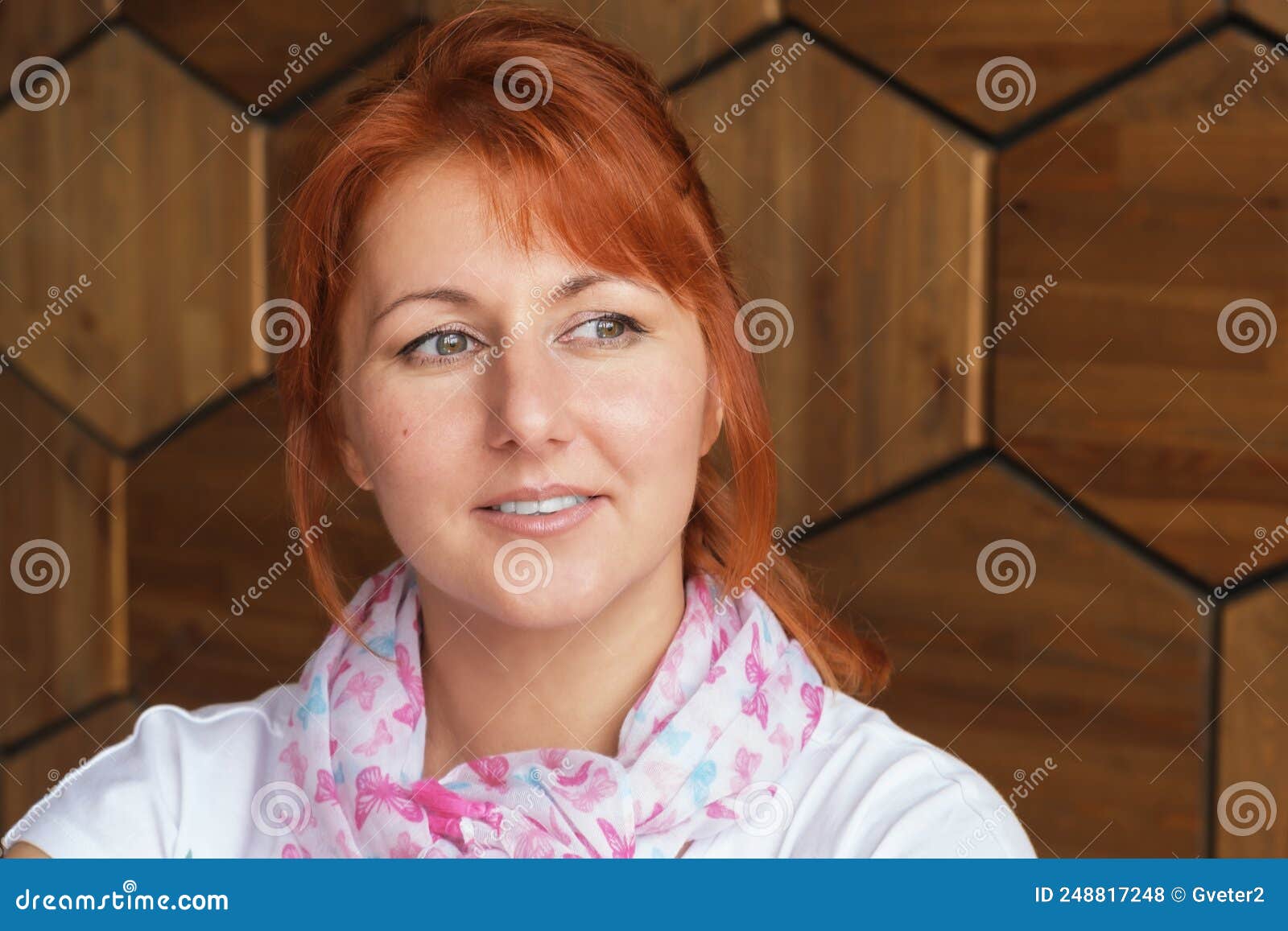 Portrait of a Redhaired Middleaged Woman with Gathered Hair Stock