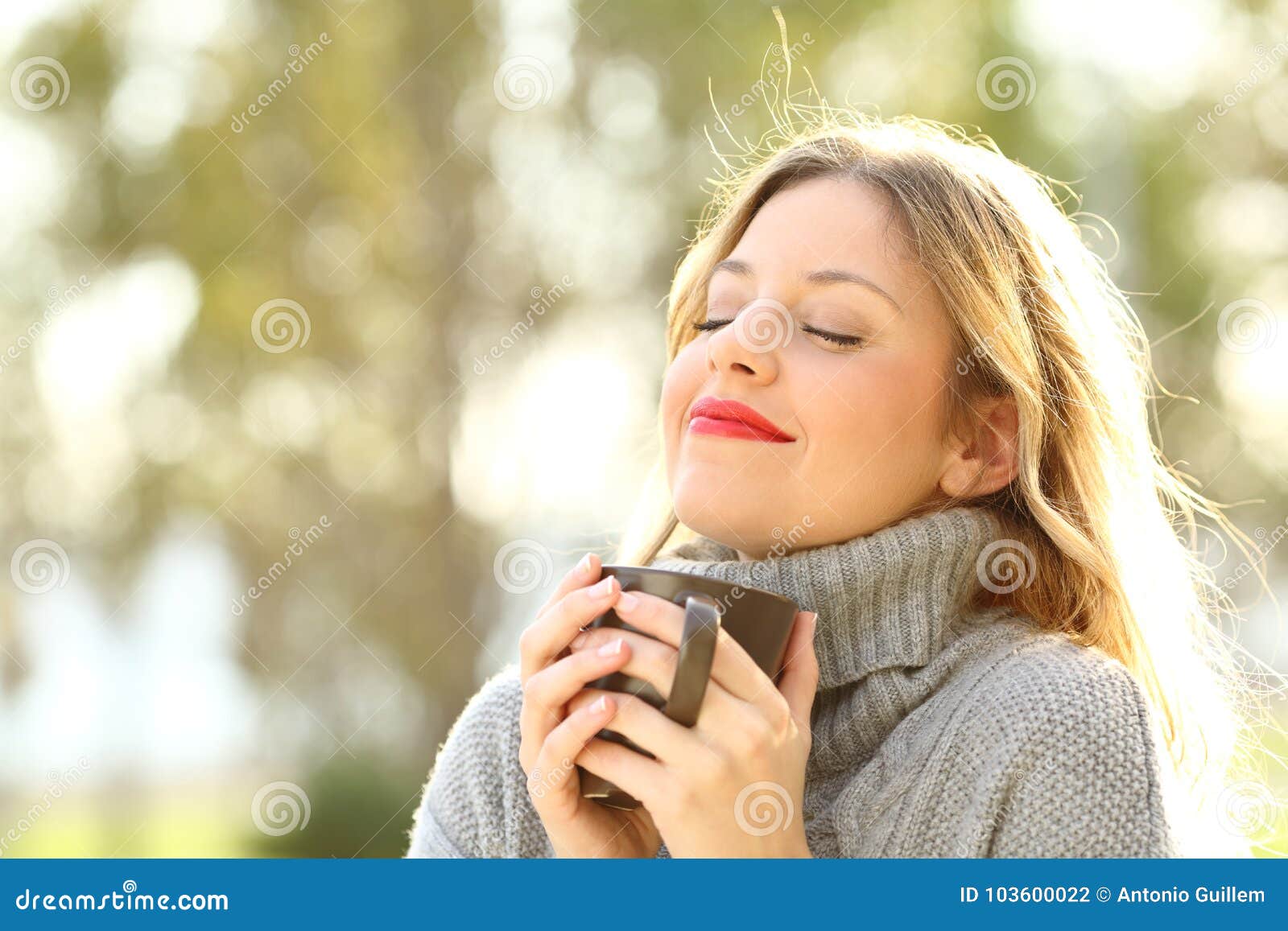 relaxed girl breathing outdoors in winter