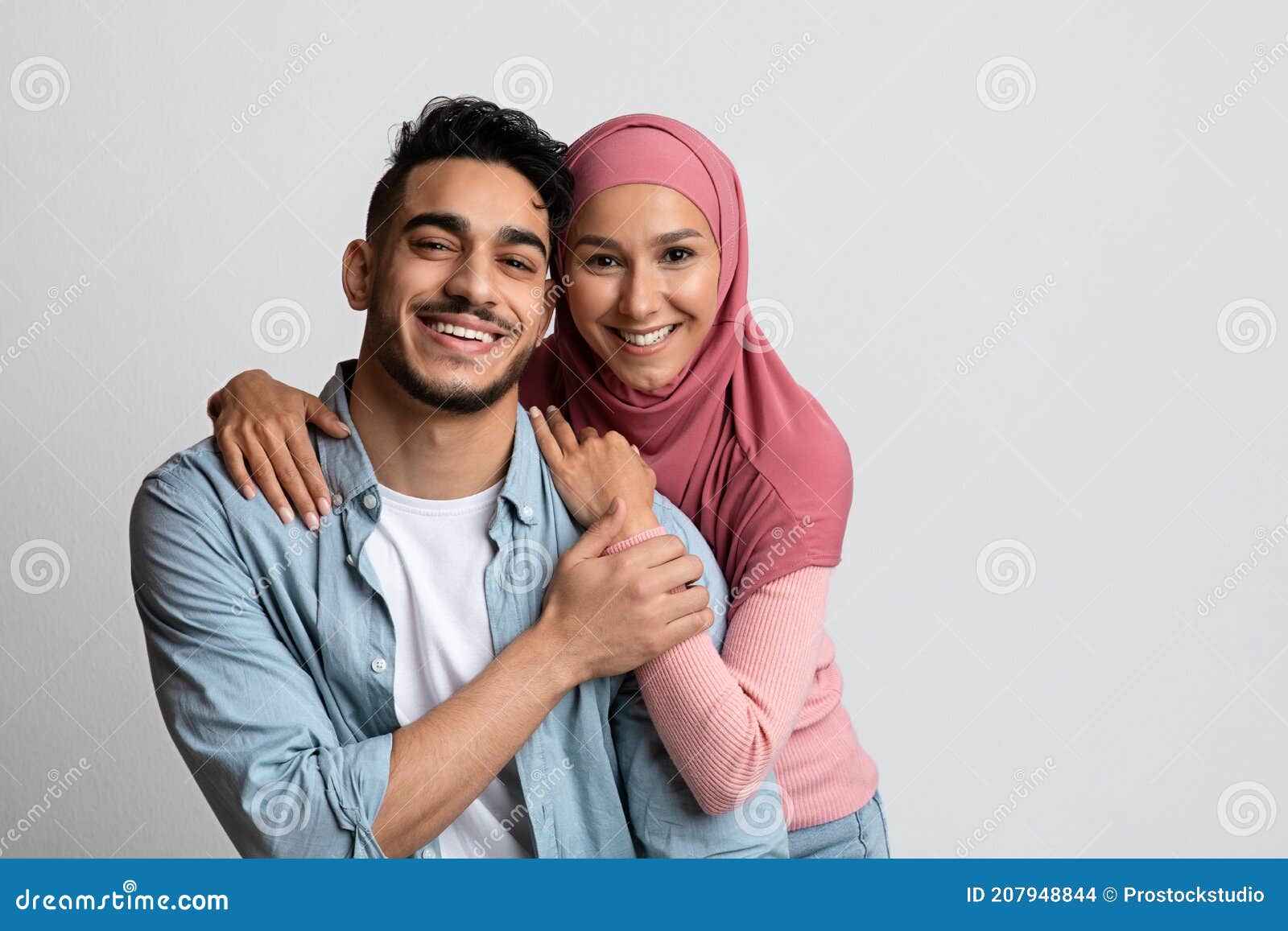 Portrait of Romantic Smiling Muslim Couple Posing Over Grey Studio ...