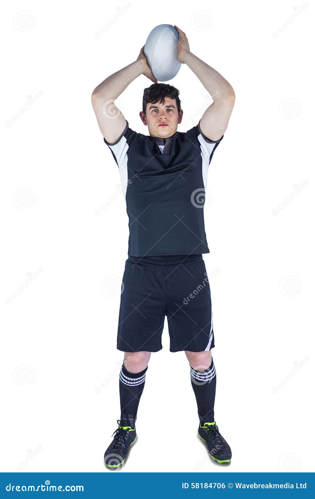 Portrait Of Rugby Player Wearing Helmet With Arms Crossed RoyaltyFree Stock Photo