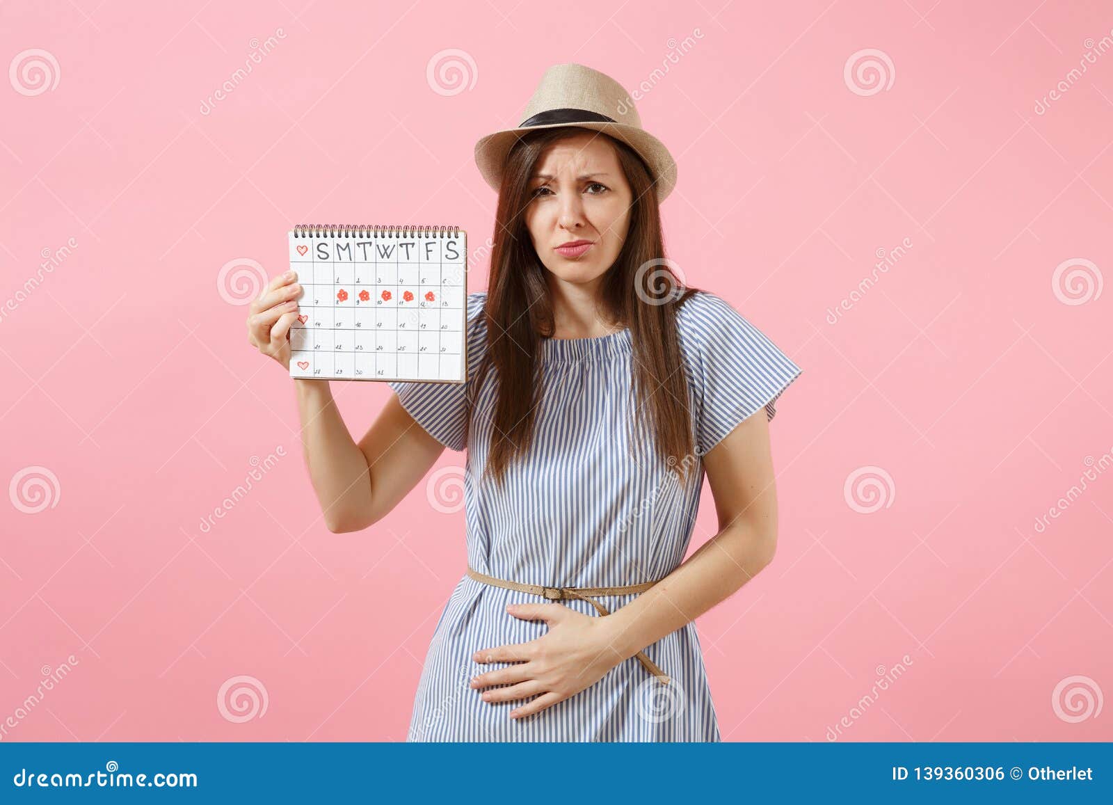 Portrait Sad Illness Woman In Blue Dress Holding Periods Calendar For