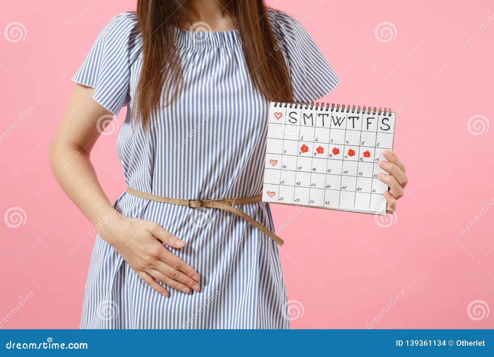 Portrait Sad Illness Woman In Blue Dress Holding Periods Calendar For