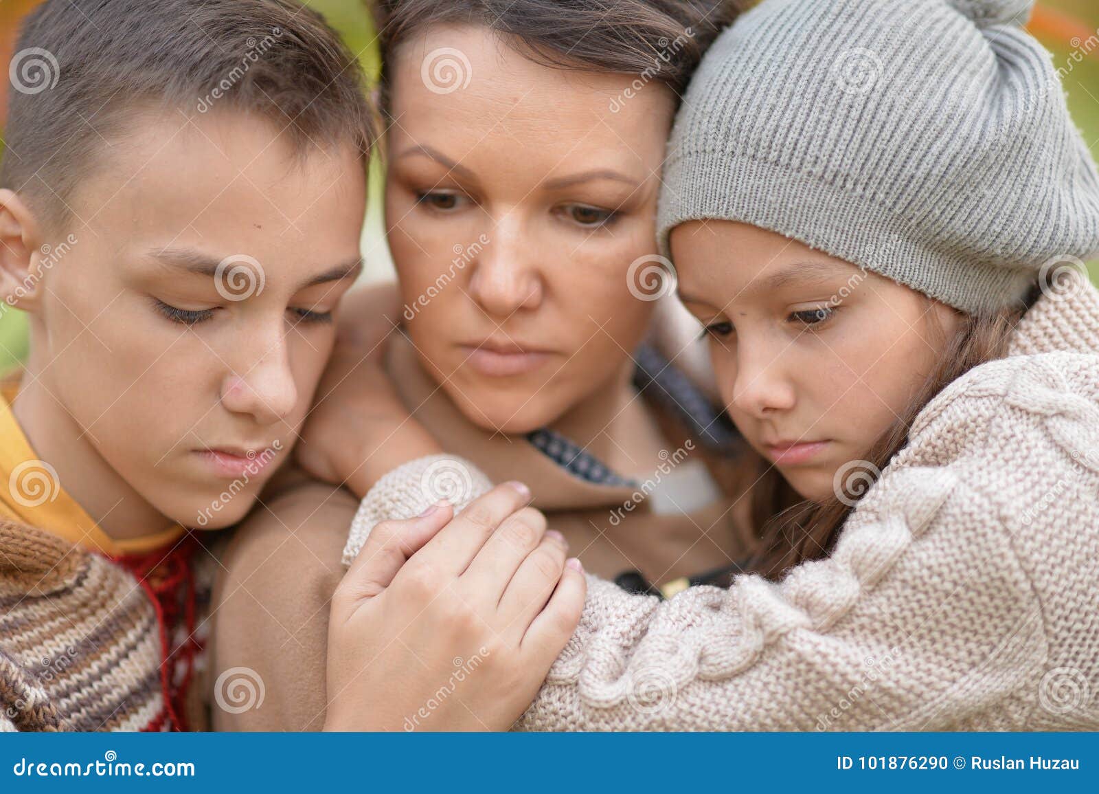 sad mother and children