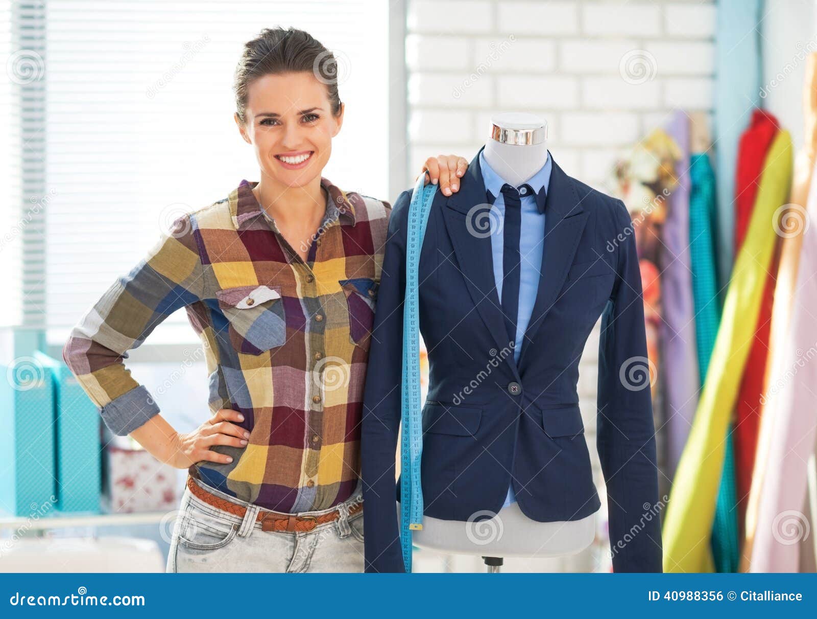 Portrait of Seamstress Near Mannequin in Suit Stock Photo - Image of ...