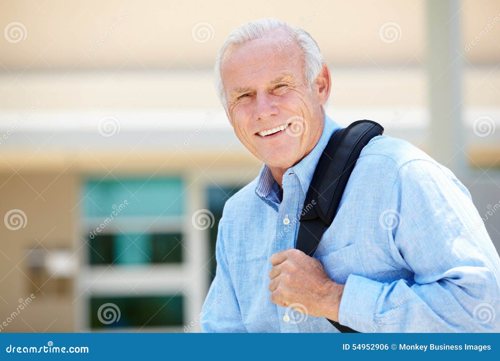 portrait senior man sitting outdoors