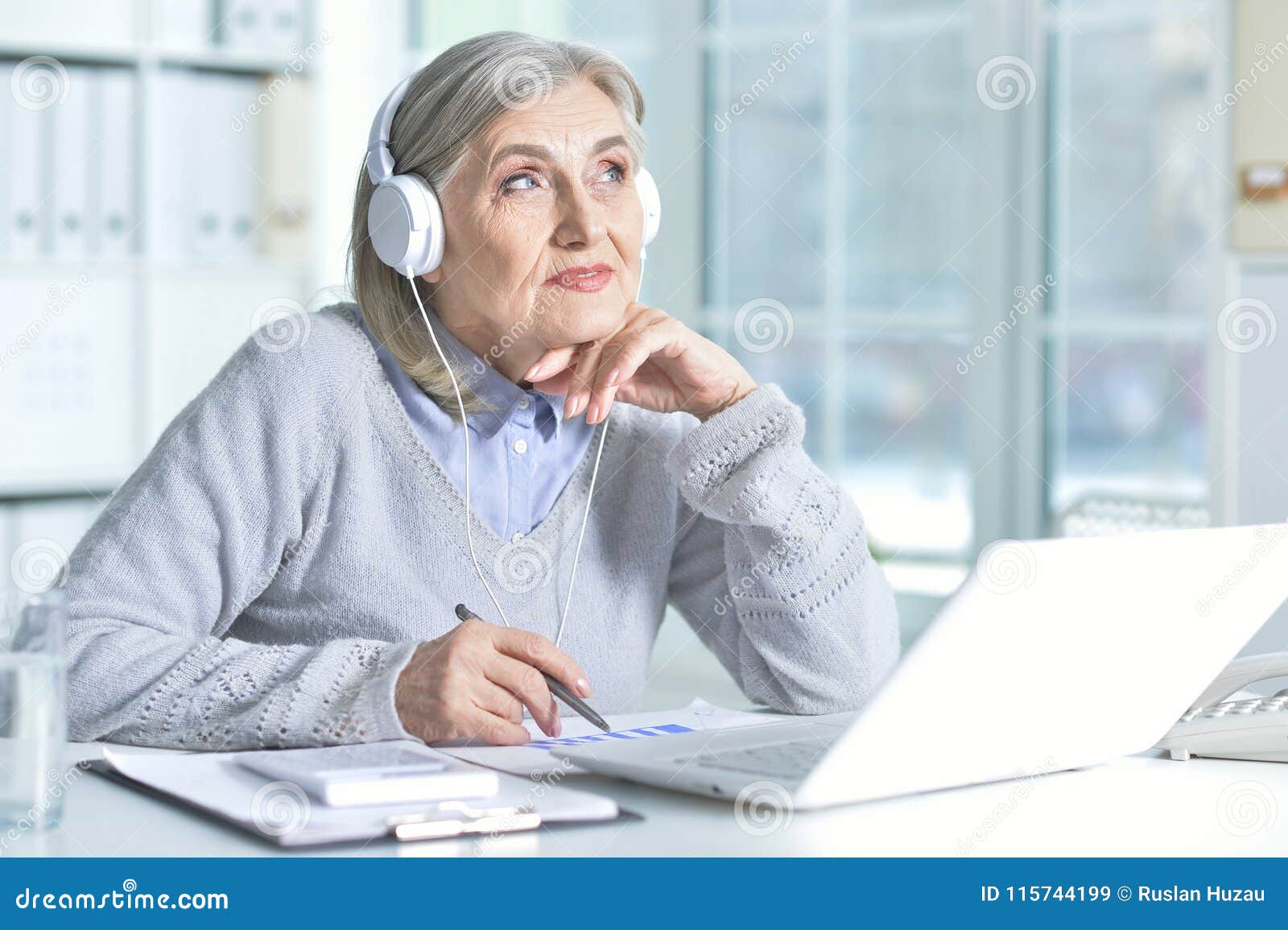 Senior woman using laptop stock image. Image of female - 115744199