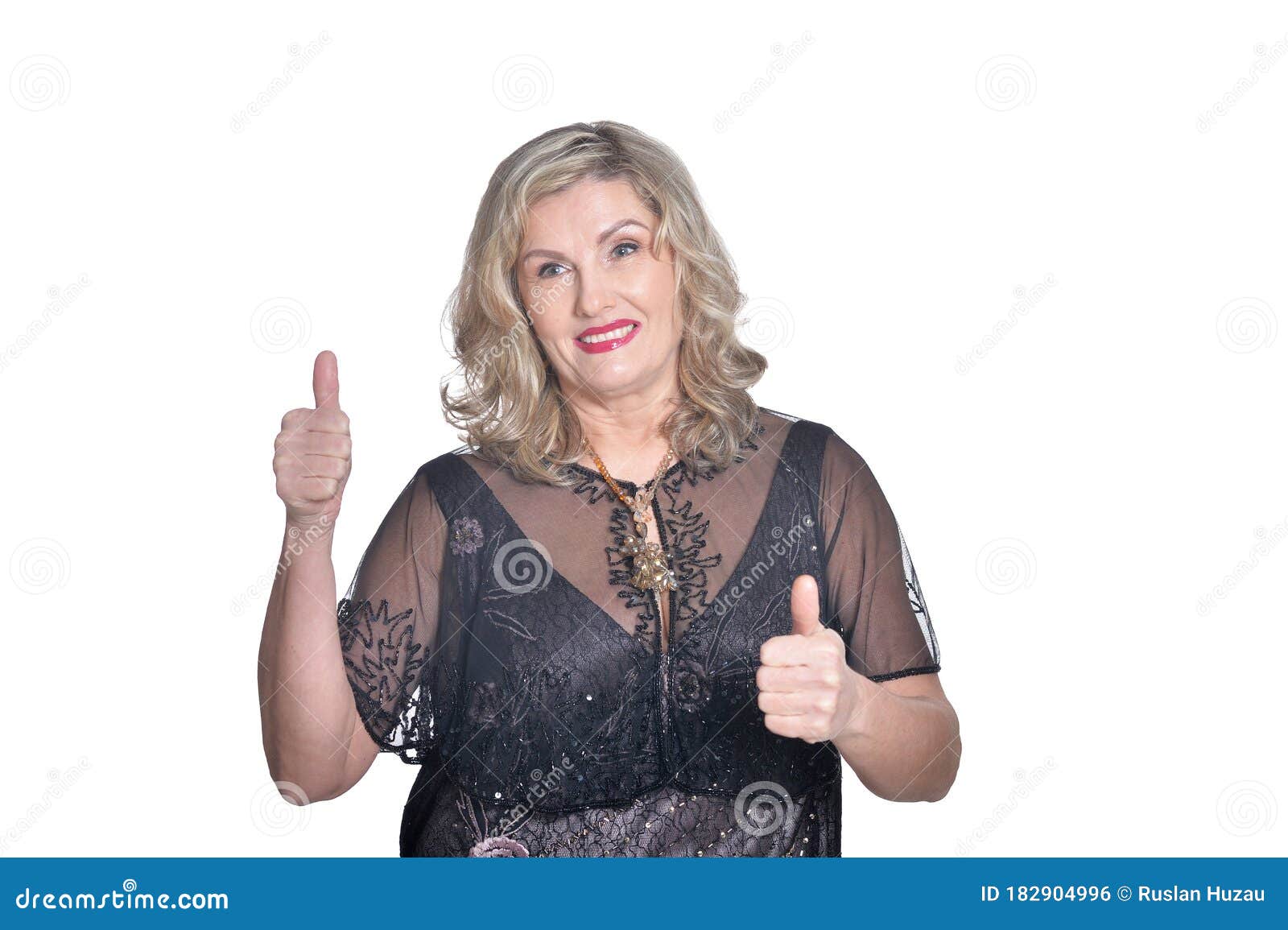 Active Elderly Woman Holding Her Thumb Up Approving Your 