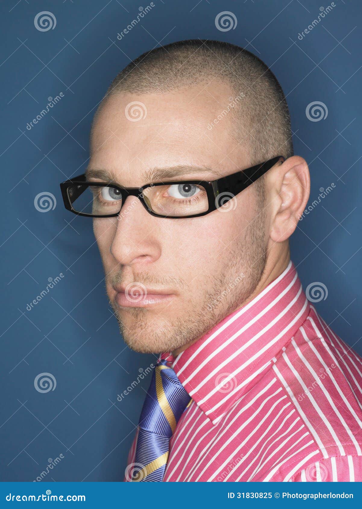 Portrait Of Serious Bald Man In Glasses Stock Image